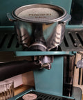 53.5mm Espresso Puck Screen Reusable 1.7mm Thick 100 Micron Stainless Steel Filter Mesh Plate in portafilter on espresso machine.