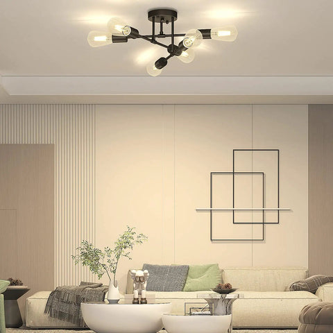 Living room with modern lighting, featuring 2 Light Black Vanity Light Fixture Over Mirror With Clear Glass Shades Go-To Modern Wall Sconce Lighting.