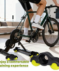 Indoor setup with 4 Pack Bike Trainer Rocker Feet Adapters, featuring stable rocker feet and tennis balls for realistic cycling.