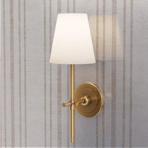 Straight Up Gorgeous Beige Stripe Wallpaper With A Sleek Neutral Silver Metallic Sheen And Cozy Fibrous Texture For That Perfect Modern Lounge Vibe Eco Friendly Pvc Free Wallcovering with a gold wall sconce.