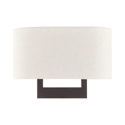 Bronze Wall Sconce With Contemporary Design, sleek modern lighting with oatmeal fabric shade, perfect accent for modern homes