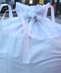 Close-up view of Two Pack FIBC Bulk Bags 2200 Lb Load Capacity 35L X 35W X 43H Inches Woven Polypropylene Sacks With Four Hooks Flat Bottom.