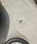 Heavy Duty Chassis Bolt And Washer Kit For F250 F350 Trucks In Silver Finish With Noise Reduction And Vibration Dampening Built To Last And Provide A Quieter Ride With Rock Solid Bed Mounting Hardware For Tough Jobs, bolt set on concrete