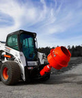 Skid steer loader with Beefy Flip Mount Auger Attachment With Mixer Bowl For Skid Steer Loaders ET 3500 Drive on gravel site