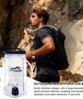 Man hiking with All Day Hydration Bladder for Hiking and Outdoors 1.5L to 2L Large Opening Water Reservoir, using sip tube.
