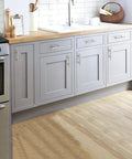 Modern kitchen with 30 Pack 5 Inch Cabinet Pulls With 3 Inch Hole Centers Zinc Alloy Handles In Brushed Nickel Finish For Kitchen Cabinets Cupboards And Wardrobes, 1/2 Inch Diameter And 1-1/4 Inch Projection installed on gray cabinets.