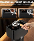 Vertical Electric Espresso Portafilter Cleaner With Knock Box Combo Auto Ground Removal For Home And Cafe Baristas Smooth Daily Grind Cleanup Universal Fit Quick Dump Station in use cleaning portafilter.