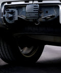 Car with 2 Inch Trailer Hitch Cover Plug With Metal American Black Flag Universal Fit For Any 2 Inch Hitch Receiver, rear view.
