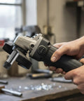 Person holding Threaded Angle Grinder Extension Rod to Drill Adapter with ER16 Spring Collet Set in workshop.