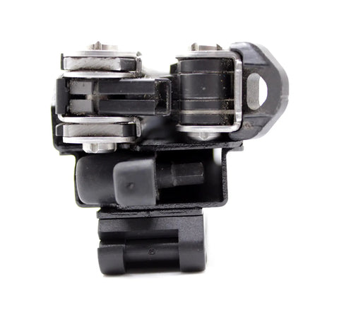 Close-up of Center-Drive Multitool Sheath With Quick Draw Retention And Bit Kit Pocket showing metal construction and retention mechanism