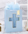 Blue Cross Window Gift Bag With Ribbon Handles, Totally Perfect For Baby Boy Baptisms, Christenings, And First Communions, Comes With Tissue Paper, 10 By 5 By 13 Inches, 1 Bag in decorative setting