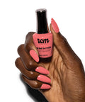 Hand holding Hollywood Vibes Hema Free Gel Nail Polish Delivers Long Lasting Chip Resistant Manicure For Weeks 9ml bottle