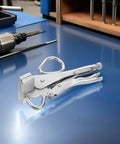 Heavy Duty Auto Body Sheet Metal Repair Pliers With Adjustable Locking Welding Clamp on blue workbench
