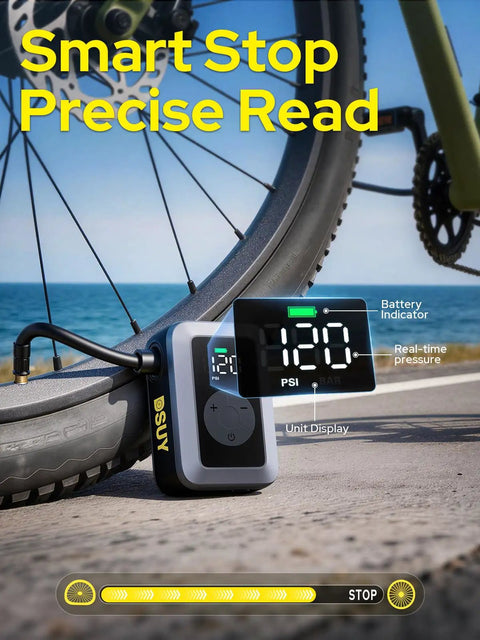 Mini Bike Tire Pump With Digital Gauge And Auto Stop next to bicycle tire on road with PSI display showing 120