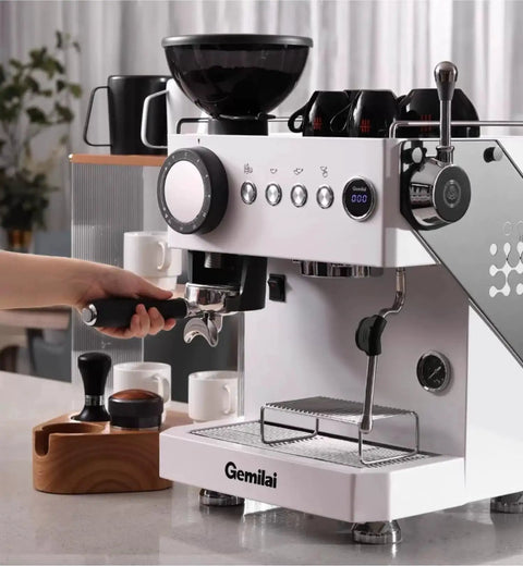 Semi Automatic Espresso Machine With Built In Grinder For Home Use Dual Mode Espresso Maker Single Or Double Shots 250g Bean Hopper Calibrated Tamping And Intuitive Guidance White on kitchen counter, portafilter in hand.