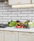 Modern kitchen counter with 5 Pack Brass Champagne Gold Square Cabinet Pulls For Kitchen Cabinets And Drawers, showcasing vegetables.