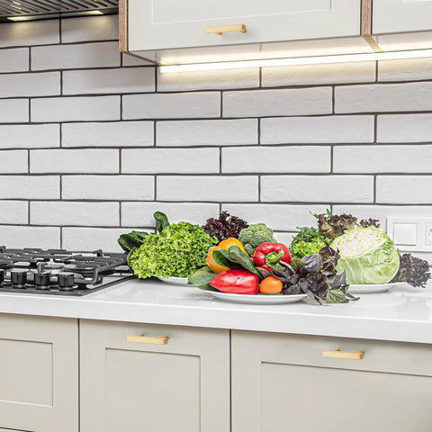Modern kitchen counter with 5 Pack Brass Champagne Gold Square Cabinet Pulls For Kitchen Cabinets And Drawers, showcasing vegetables.