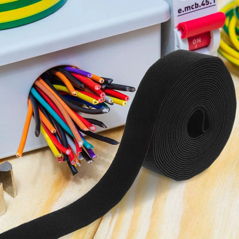 Reusable Plant Themed Hook And Loop Cable Ties Keep Your Setup Hella Tidy With These Self Adhesive Wire Organizers, black strap on wooden desk.