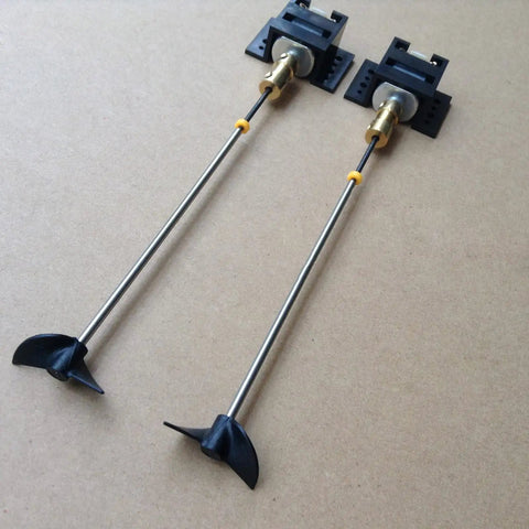 Two 130 Motors RC Boat Drive Set With Motor Seats Copper Couplings 12cm Shaft Propeller Kit For DIY Model Ship Under 30cm Long Dual Motors For High Torque Speed And Smooth Turning Plug And Play showing two shafts and propellers.
