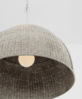 Top Shelf One Light Handwoven Dome Pendant Lamp With Vintage Gold Leaf Finish Heavy Duty Steel Customizable Hang Height Damp Rated Bathroom Ceiling Fixture Slick Organic Vibe For Any Space close-up view of woven rattan shade