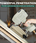 Hand using St64 14 Gauge Pneumatic Concrete T Nailer with 400 Concrete T Nails, 3/4 to 2-1/2 in, on wooden boards