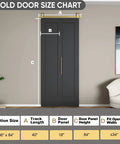 36 Inch By 84 Inch Bi-Fold Barn Door With Brushed Gold Hardware Kit in a textured black finish installed in living room.