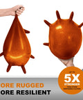 Extreme Duty Orange Nitrile Gloves With 8 Plus Mil Thickness And Textured Non Slip Grip Built Tough As Nails For Mechanics And Tradesmen Powder Free Latex Free Industrial Work Gear That Handles The Rough Stuff displayed in hand, showcasing strength and flexibility.