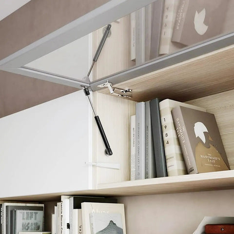 Gas Struts 10 Inch 33 Lb With Brackets Heavy Duty Lift Supports for kitchen cupboard door open, showing book storage