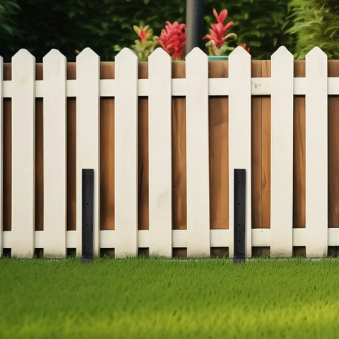 Two Pack Heavy Duty Metal Fence Post Repair Kit With Ground Spike Anchors For Tilted Or Broken Posts Quick Setup For Versatile Garden And Backyard Use installed on wooden fence.
