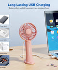 Handheld Portable Fan With 4000mAh Rechargeable Battery And 10 Hour Battery Life plugged into laptop via USB