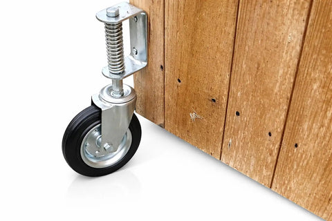 8 Inch Spring Loaded Gate Caster With 360 Degree Swivel Built To Last Heavy Duty 375 Lb Capacity, Solid Rubber Flat Free Wheel, mounted on wood gate