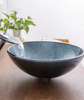 USZWBY Blue Bathroom Vessel Sink, Round 16.5" Tempered Glass Vessel Vanity Sink with waterfall faucet in a modern setting.