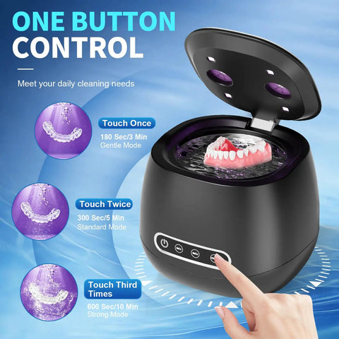 Rechargeable 45kHz Ultrasonic Retainer Cleaner for Dentures Aligners Night Guards Braces and Jewelry Portable 200ML Capacity with 3 Cleaning Modes for On The Go Black showing open unit with dentures inside