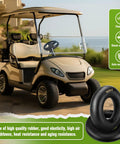Premium Heavy Duty 18x8.50-8 And 18x9.50-8 Inner Tube Featuring Tr-13 Valve Stem Heavy Hauler beside golf cart on outdoor path.