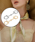 4 Piece Horse Bit Buckle Set In Silver And Gold with Double Silk Scarf Ring on woman's neck for DIY jewelry and shoe decor