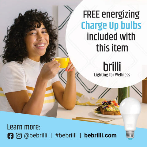 Woman enjoying coffee next to promotional text for FREE Charge Up bulbs, included with Brilli Lighting for Wellness product.