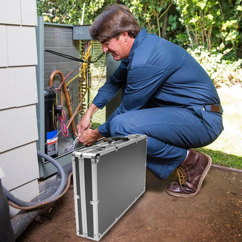 Technician using Rugged Aluminum Case With Foam Inserts Portable Hard Case Organizer For Tools And Gear, Ideal For Test Instruments And Cameras.