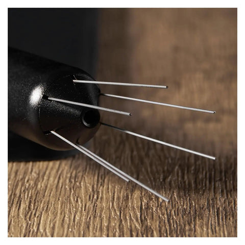 Close-up of the Next Level Espresso Distribution Tool With Retractable Stainless Steel Needle for portafilter clump crushing.