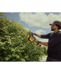 Individual using 20V Max 22 Inch Cordless Hedge Trimmer Bare Tool Only With Up To 78 Minute Runtime Powerhouse Motor for clean cuts