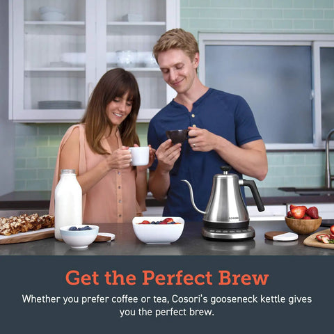 Cosori Gooseneck Electric Kettle 0.8 Liters Silver Precision Pour Over Coffee And Tea Maker With Keep Warm Feature For Barista Quality Brews Daily on kitchen counter with two people enjoying drinks.