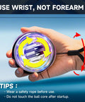 Person holding Torque Ball Hand Exerciser Dope Grip Strength Trainer For Forearm Strengthener Wrist Power Gyro Ball Hand Strengthening Device Wrist Strengthener Finger Exerciser Auto Start Black Without Light