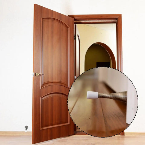 40 Pack Rubber Door Stopper Caps 0.39 Inch Hole End Caps For Wall Protection Soft TPR Rubber Replacement For Doors And Walls White Fits Most Doors No Brainer Install Keeps Walls Safe Prevents Scratches And Dings, shown installed on spring door stopper against wooden door.