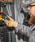 Electrician using Clamp Meter Electrical Test Kit With Auto Ranging, Measures AC Current Up To 400 Amps, Backlit Display on panel