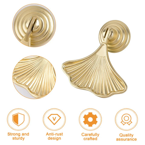 Six Piece Golden Ginkgo Leaf Cabinet Knobs, Smooth Drop Pendant Pull Handle Hardware For Drawers And Wardrobes, close-up view of golden finish and intricate design.