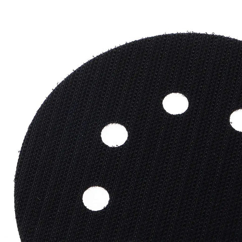 Close-up of Pro Grade 5 Inch 8 Hole Hook and Loop Soft Sponge Buffer Pad for Sanding and Polishing showing holes detail.
