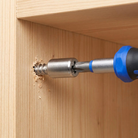 Heavy Duty Cabinet Shelf Peg Set With 150 Self Tapping Shelf Pins And 150 Sleeves 0.3 Inch being installed in wood cabinet