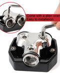 Power Distribution Block For Car Audio With One 0 Gauge In And Two 0 Gauge Out, black metal block with Allen wrench installed