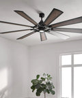 Badass Heavy Duty 85 Inch Ceiling Fan With Bright LED Lighting And Slick Distressed Black Industrial Finish Plus Nine Blade Quiet Airflow Blades For Cool Bedroom Relaxation, sleek design with modern blades in bright room.