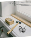 Heavy Duty Double Bearing Sliding Door Pulley Kit parts including stainless steel wheels on a workbench with tools.