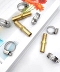 3/8 Inch Hose Repair Kit with brass barb splicer connectors and 6 stainless steel clamps on a white surface